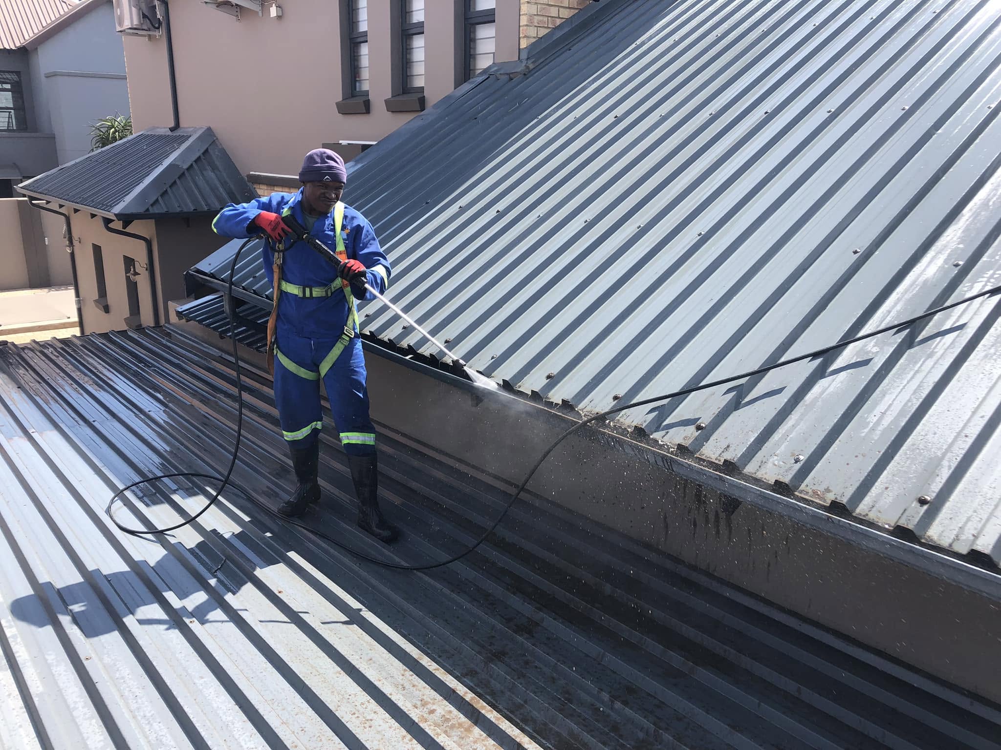 Cleaning roof and gutters